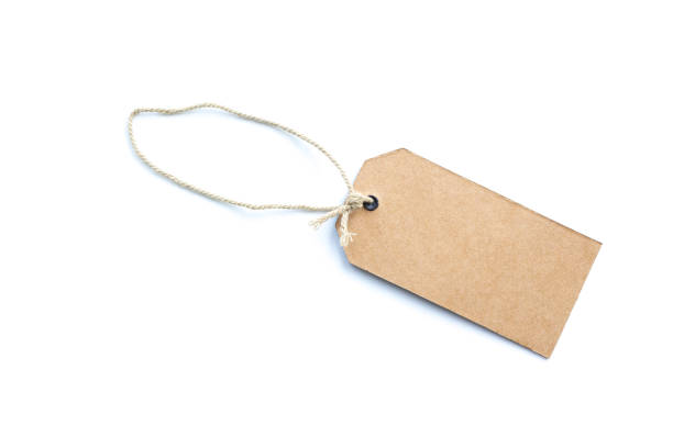 istock Blank brown cardboard price tag or label  isolated on white background. 1027966190