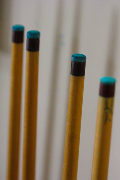 istock A Row of Snooker Cues closeup against wall 1027966492