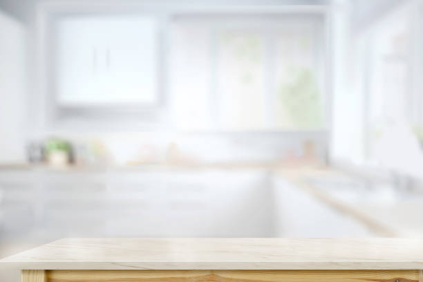 istock Empty Marble top table for product or food montage with modern kitchen room background. 1027968840