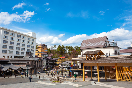 Gunma, Japan - April 27 2018: Kusatsu Onsen located about 200 kilometers north-northwest of Tokyo, it is one of Japan's most famous hot spring resorts for centuries