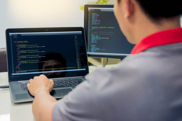 Developing programming and coding technologies on desk white, Website design, Programmer working in a software develop company office,Data processing center stock photo