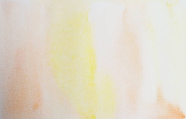 istock Brown and yellow stains flow on white surface 1028003006