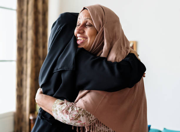 istock Muslim women hugging each other 1028029508