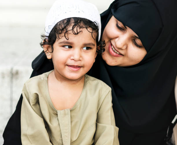 istock Muslim mother and her son 1028031608