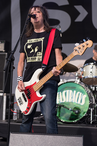 Seattle, USA - Aug 11, 2018: Kim Warnick of the Fastbacks at the SPF30 SUB POP party on the Beach in West Seattle late in the day.
