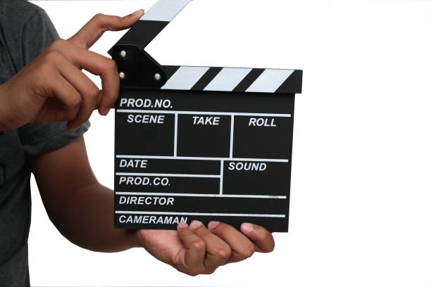 istock hand holding slate movie isolated 1028037956