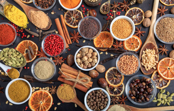 istock Composition of spices on a black background 1028038434