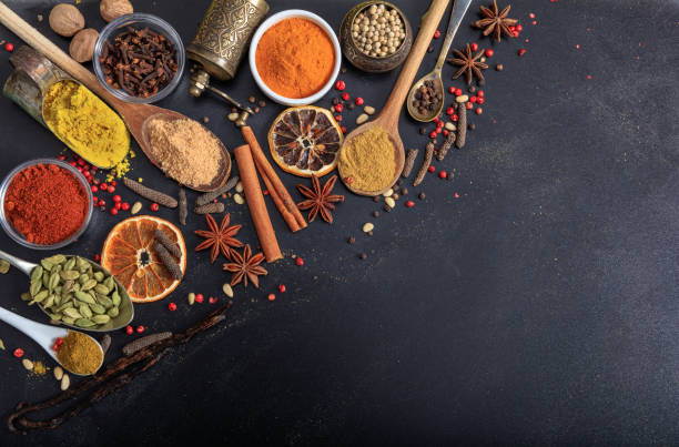 istock Composition of spices on a black background 1028038450
