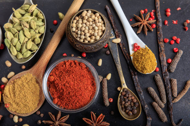 istock Composition of spices on a black background 1028038458