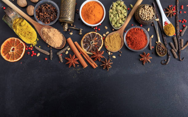 istock Composition of spices on a black background 1028038478