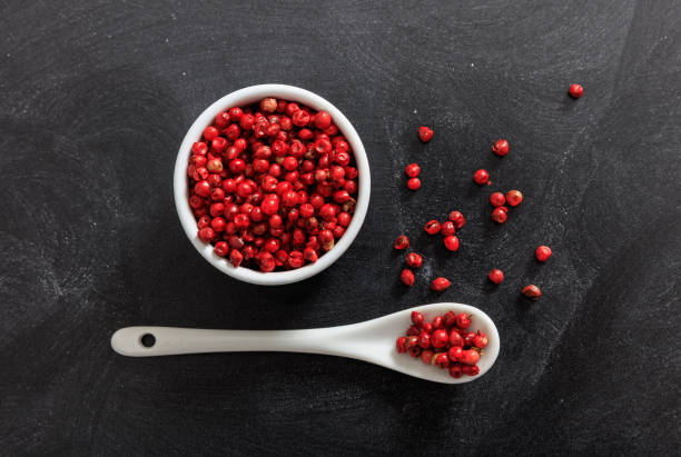 istock Red pepper spice seeds in porcelain bowl and spoon 1028038554