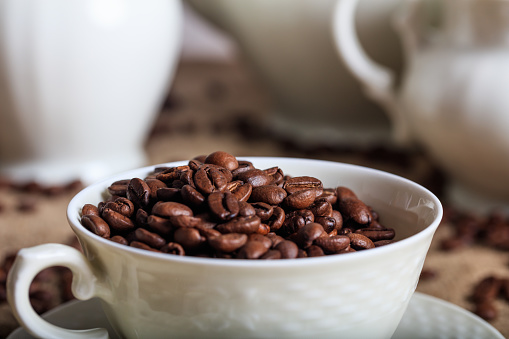 Cup with coffee beans