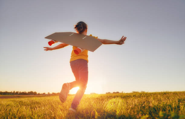 istock girl playing astronaut 1028050650