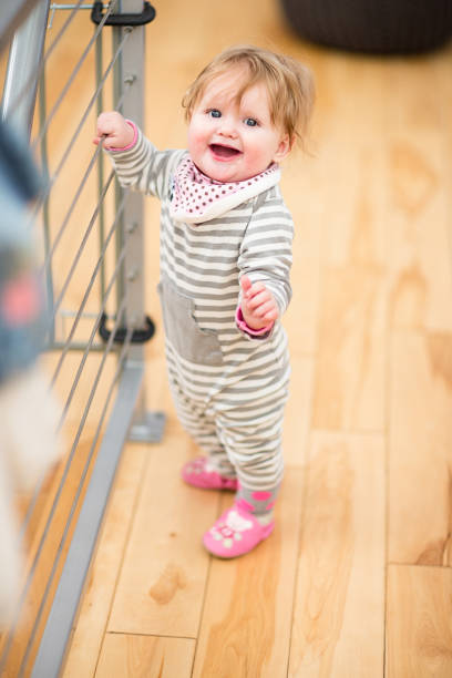 istock 8 month old standing proudly 1028056590