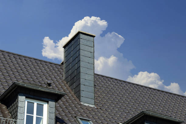 istock New tiled roof with chimney with slate cladding 1028064880