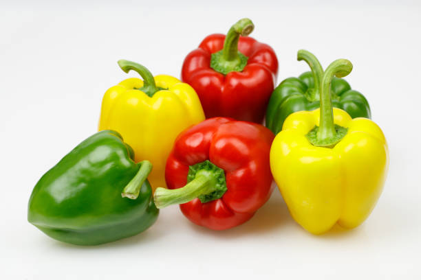 istock Colorful bell peppers, on white background. 1028067374