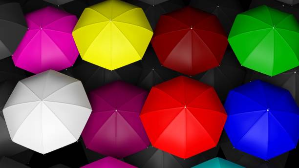 istock 3D rendering of large colorful umbrellas tops 1028067410