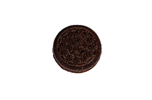 istock Chocolate cookie with cream filling isolated on white background 1028071576