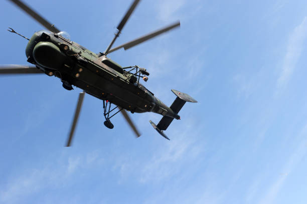 istock Military helicopter low and close angle view 1028071892