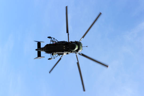 istock Military helicopter low and close angle view 1028071942