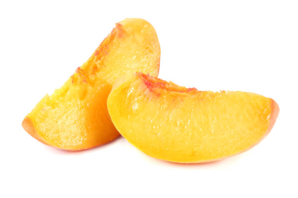 istock peach fruit slices isolated on white background 1028078308