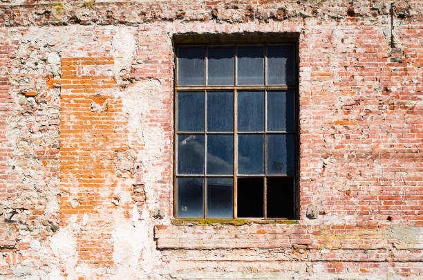 istock historic building in stone and bricks with old windows 1028078788