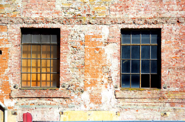 istock historic building in stone and bricks with old windows 1028082048