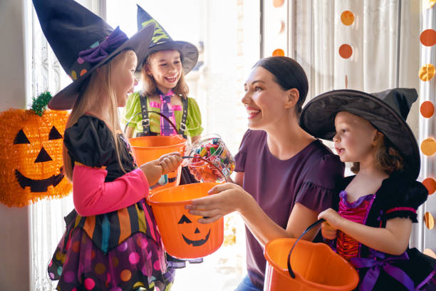 istock family celebrating Halloween 1028085670