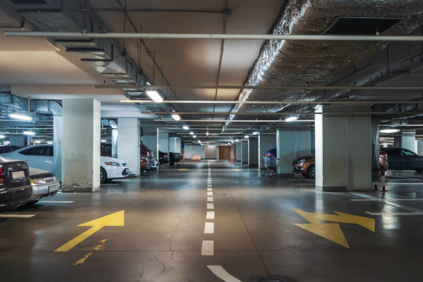 istock Underground garage or modern car parking 1028092136
