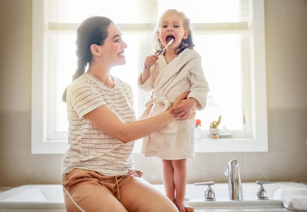 istock family are brushing teeth 1028095860