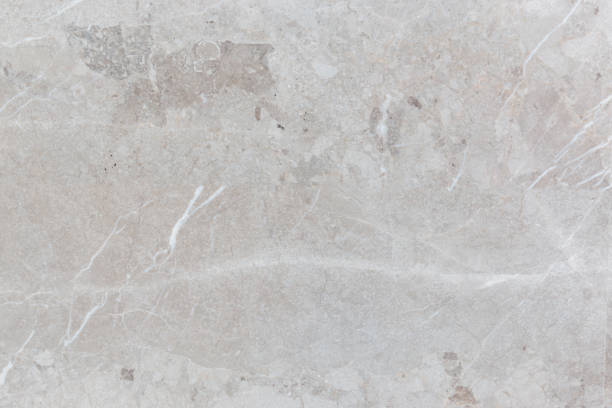 istock Granite Striped gray and white, textured background. 1028104808