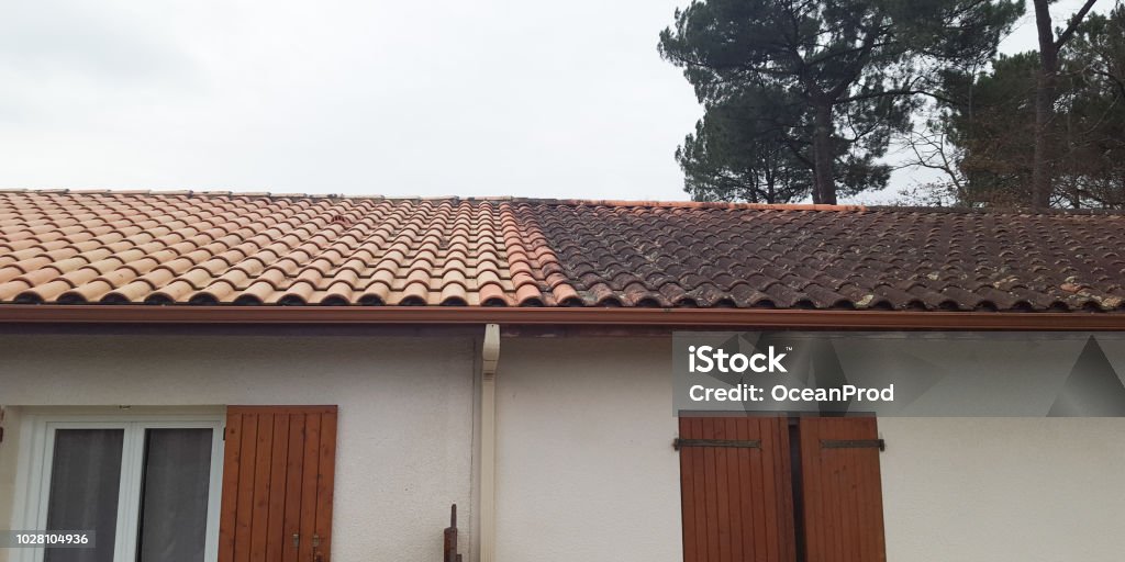 Comparison of before and after clean roof house Rooftop Stock Photo