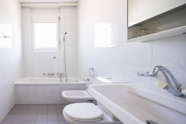 istock Bathroom with tiles and window, vintage 1028104998