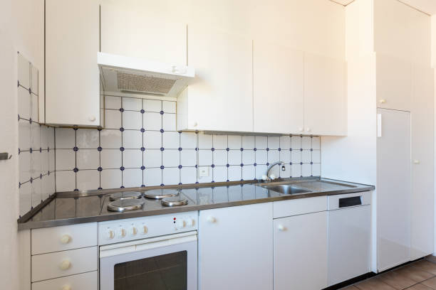 istock Kitchen with white and tile, vintage furniture 1028105116