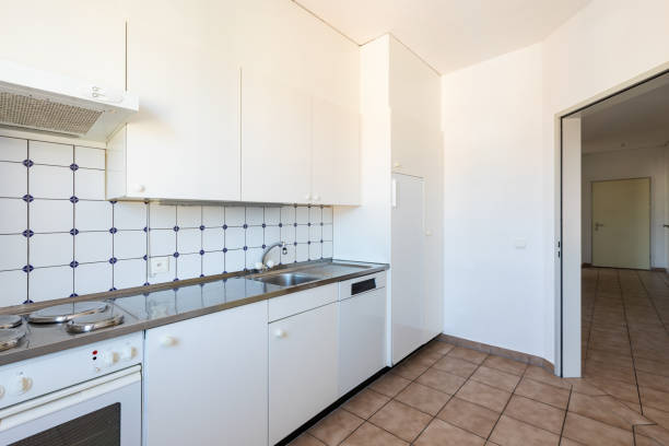 istock Kitchen with white and tile, vintage furniture 1028105154