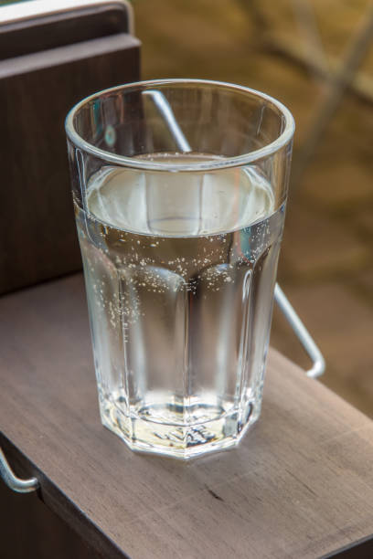 istock Cold clear water on a small wooden table 1028120150