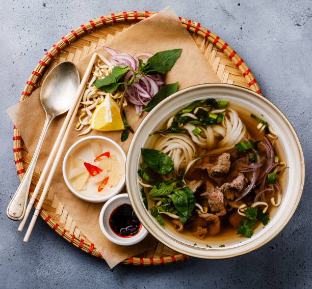 istock Pho Bo vietnamese Soup with beef in tray 1028123456