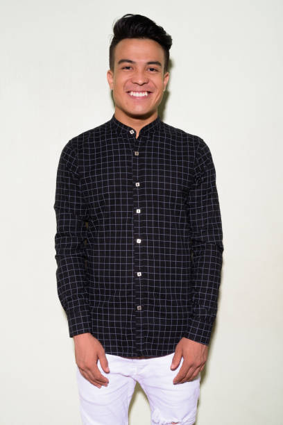 istock Young multi-ethnic man wearing smart clothing against white background 1028124560