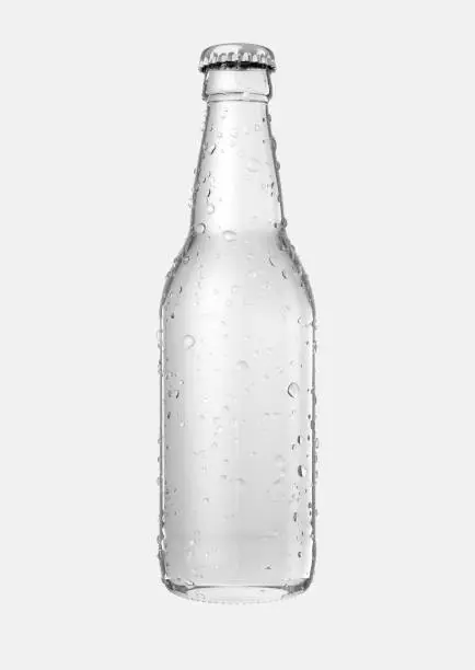 A clear glass beer bottle with droplets of condensation on an isolated white studio background - 3D render