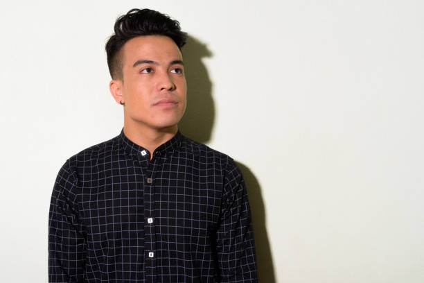 istock Young multi-ethnic man wearing smart clothing against white background 1028127034