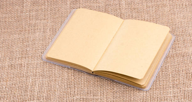 istock Pencil and notebook with a chain in the middle 1028127870