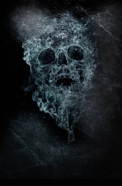 istock Human skull smoke on abstract background 1028132350