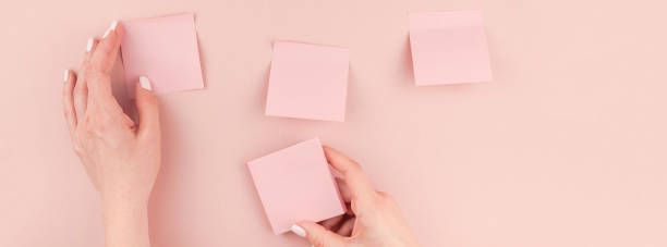 Woman hands with paper stickers