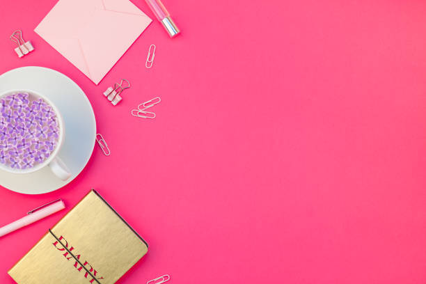 istock Styled pink feminine workspace flat lay 1028135064