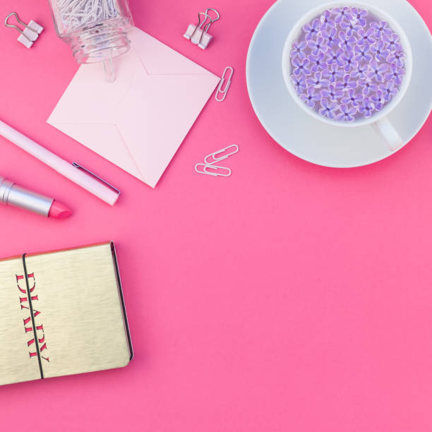 istock Styled pink feminine workspace flat lay 1028135194