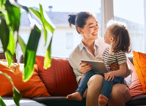 istock mom and child with tablet 1028142732