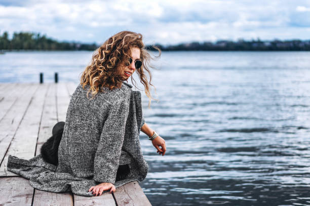 istock Pretty girl with curly hair 1028142996