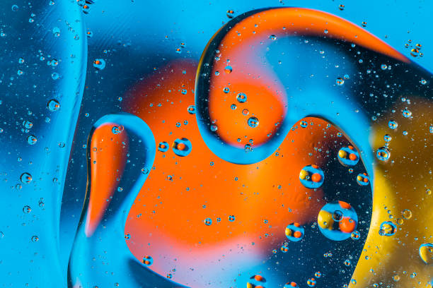 istock Abstract background with colorful gradient colors. Oil drops in water abstract psychedelic pattern image. 1028146838