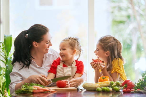 istock Happy family in the kitchen. 1028148232