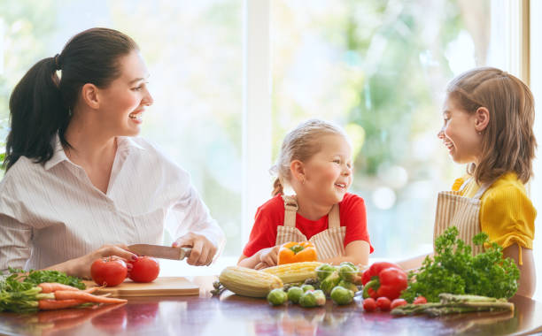 istock Happy family in the kitchen. 1028148238